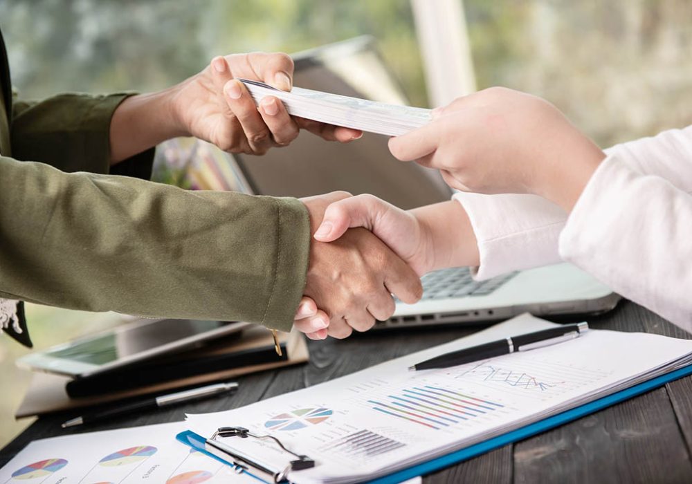 business-people-shaking-hands-finishing-up-meeting
